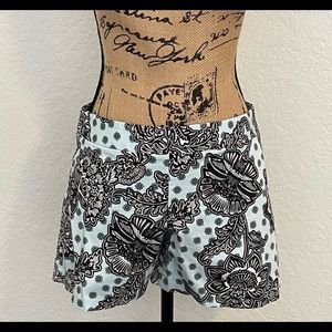Express side zipper shorts. Never worn. Blue and black paisley